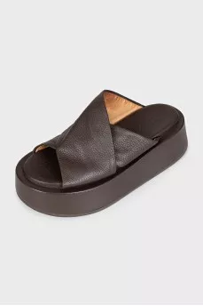 Brown leather flip-flops with high soles