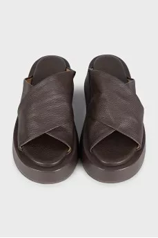 Brown leather flip-flops with high soles