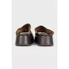 Brown leather flip-flops with high soles