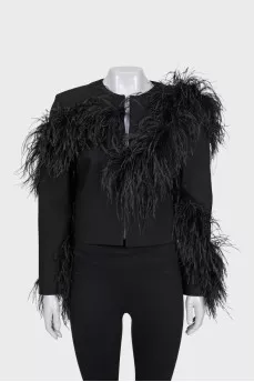 Black cropped jacket decorated with feathers