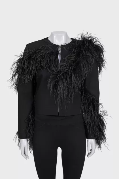 Black cropped jacket decorated with feathers
