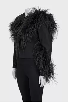 Black cropped jacket decorated with feathers