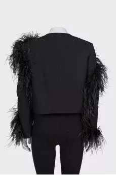 Black cropped jacket decorated with feathers