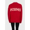 Red sweater with signature print