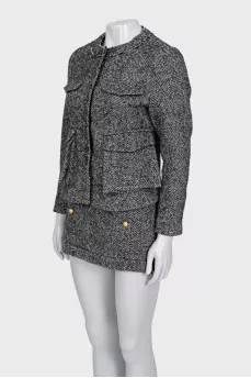 Gray suit with a printed skirt