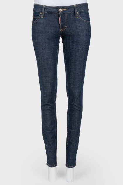 Dark-blue jeans narrowed on low landing