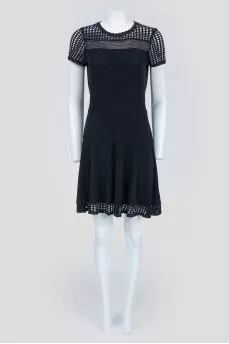 Black dress with perforated inserts