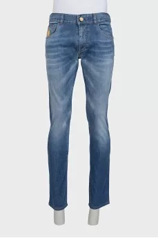 Men's jeans with gold embroidery on the pocket