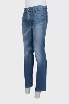 Men's jeans with gold embroidery on the pocket