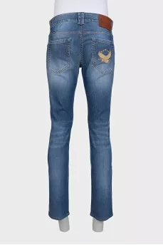 Men's jeans with gold embroidery on the pocket