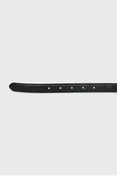 Leather belt with a heart-shaped buckle