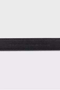 Leather belt with a heart-shaped buckle