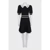 Black fitted dress with lace trim