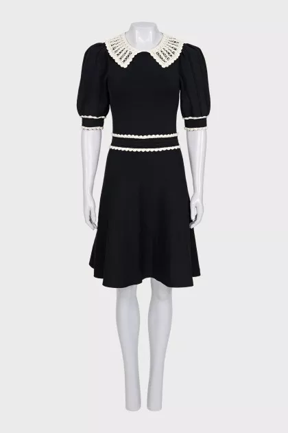 Black fitted dress with lace trim