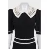 Black fitted dress with lace trim