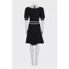 Black fitted dress with lace trim