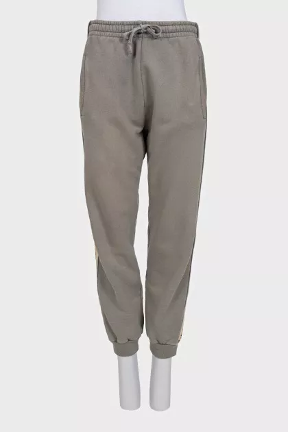Brown sweatpants with a signature print