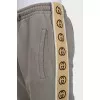 Brown sweatpants with a signature print