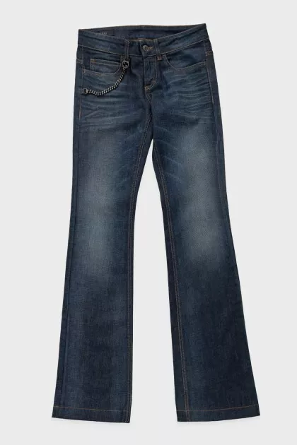 Blue flared jeans with a chain on the pocket