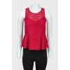 Perforated crimson peplum top