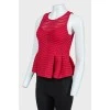 Perforated crimson peplum top