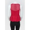 Perforated crimson peplum top