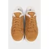 Suede sneakers with fur