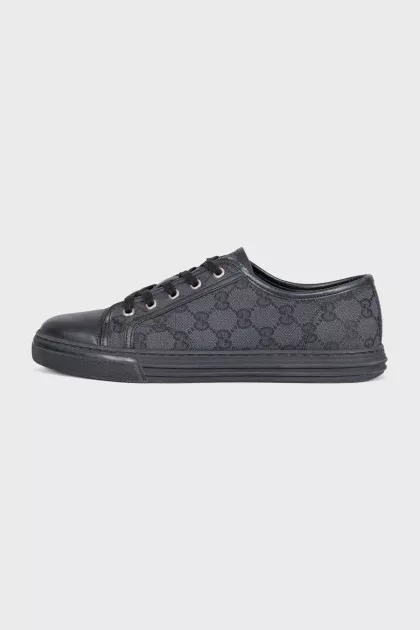 Men's black sneakers with a signature print
