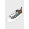 Floral print sneakers with logo