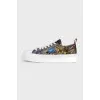 Floral print sneakers with logo