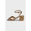 Gold-color leather sandals decorated with crystals