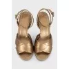 Gold-color leather sandals decorated with crystals