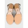 Gold-color leather sandals decorated with crystals