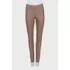Leather tapered trousers with elastic waistband