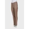 Leather tapered trousers with elastic waistband