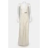 Evening milky floor-length dress with flounces