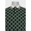 Men's green polo shirt with signature monogram