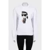 White sweatshirt with a patch