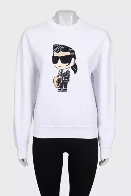 White sweatshirt with a patch