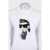 White sweatshirt with a patch