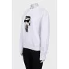 White sweatshirt with a patch