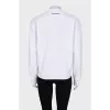 White sweatshirt with a patch