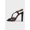 Black leather sandals with heels