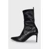 Leather ankle boots with heels and embellishments