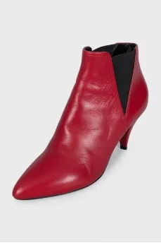 Red leather ankle boots with pointed toes