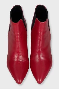 Red leather ankle boots with pointed toes