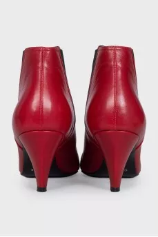 Red leather ankle boots with pointed toes