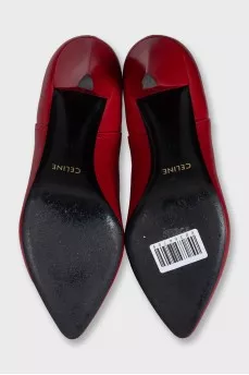 Red leather ankle boots with pointed toes