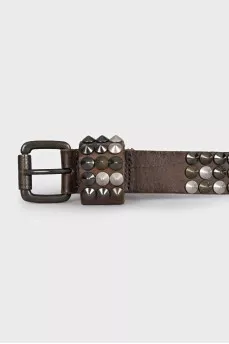 Leather belt decorated with spikes