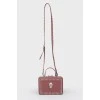 Leather bag with a skull from rhinestones